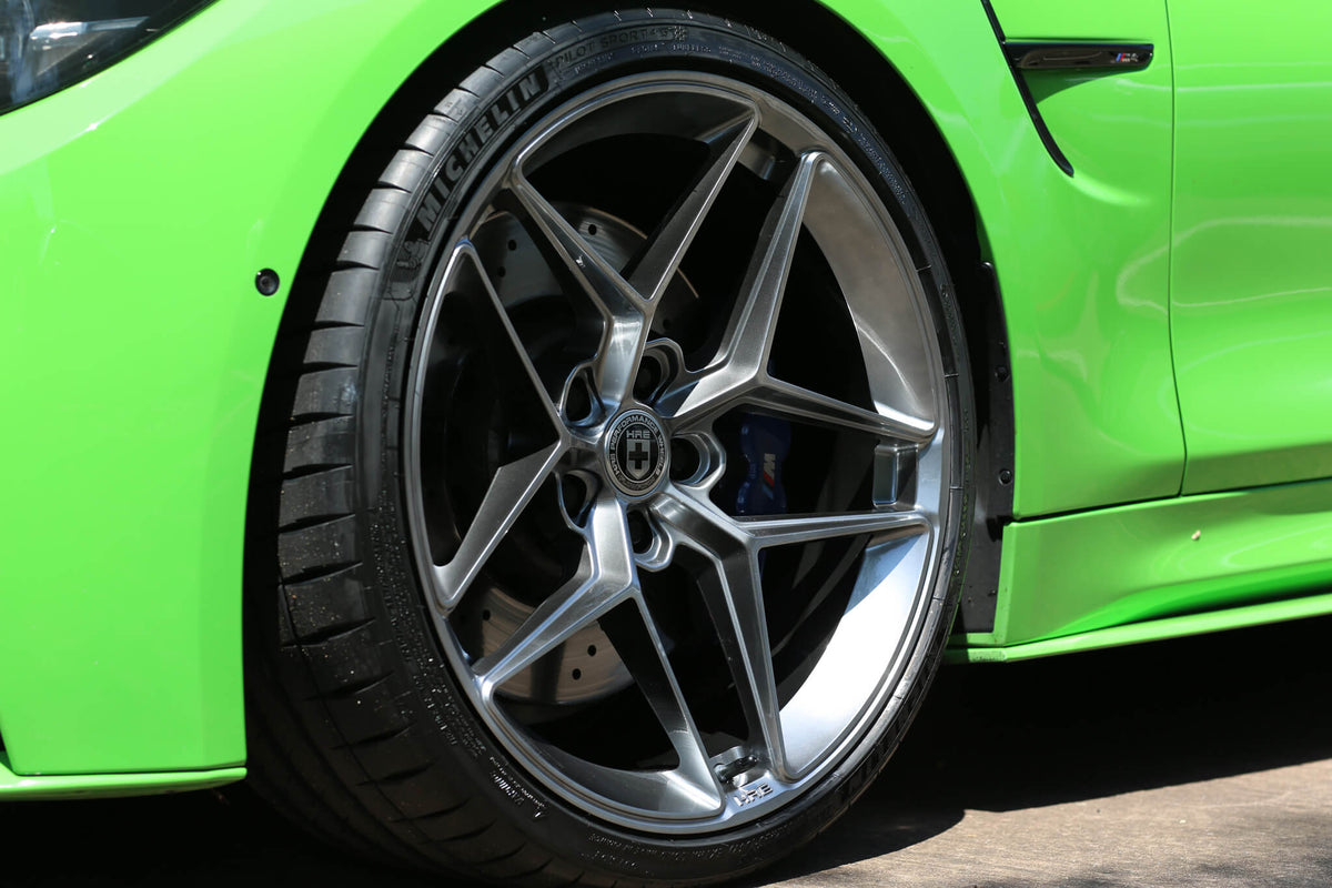 HRE PERFORMANCE WHEELS FF11 alloy wheels, four black and silver multi-spoke car wheels with polished finish and sporty design.