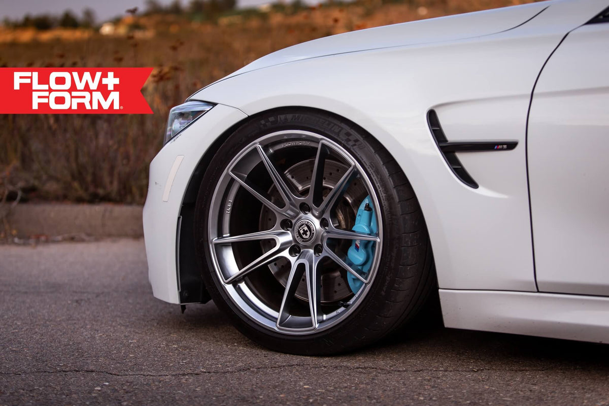 HRE PERFORMANCE WHEELS FF04 alloy wheels with a sleek multi-spoke design, shown on a vehicle.