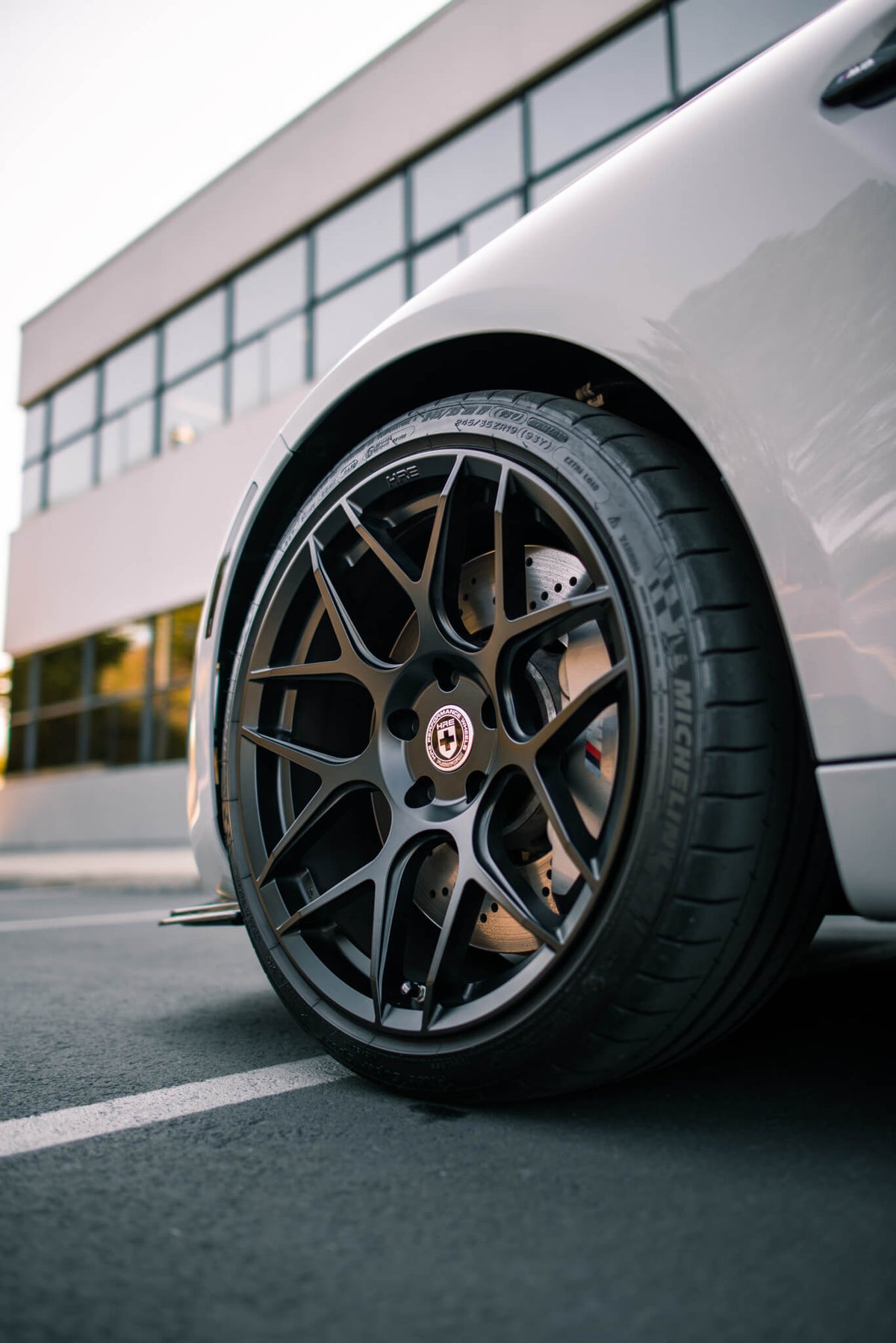 HRE PERFORMANCE WHEELS FF01 alloy wheels with multi-spoke design, shown in a close-up on a vehicle.