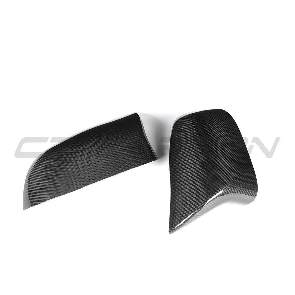 BMW X5/X6 F15/F16 2014-2019 carbon fiber mirrors by CT Carbon, showcasing sleek, lightweight aerodynamic mirror covers.