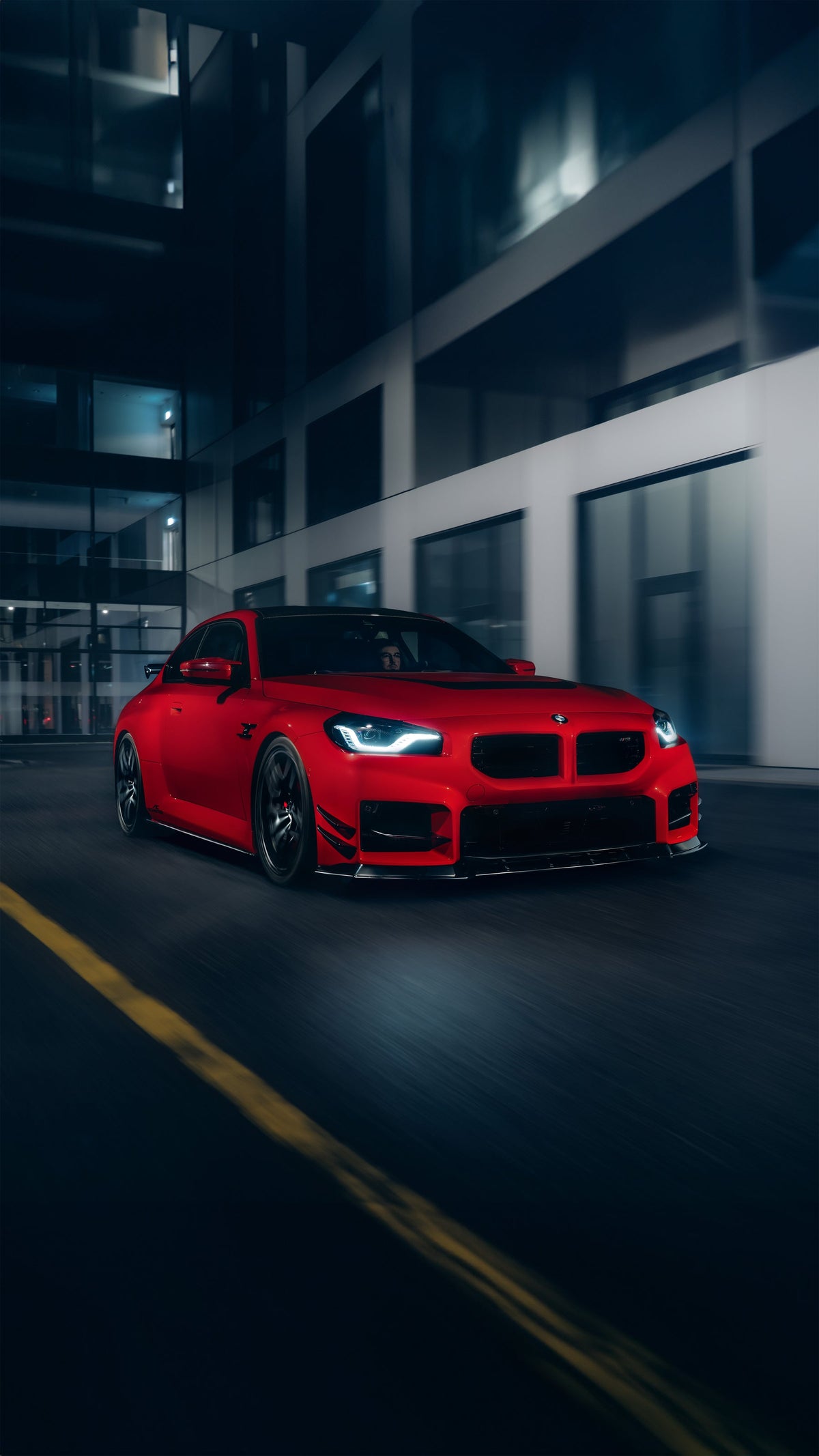 AC Schnitzer BMW M2 G87 front splitter, lightweight aerodynamic car part with a sleek black finish for enhanced performance and style.