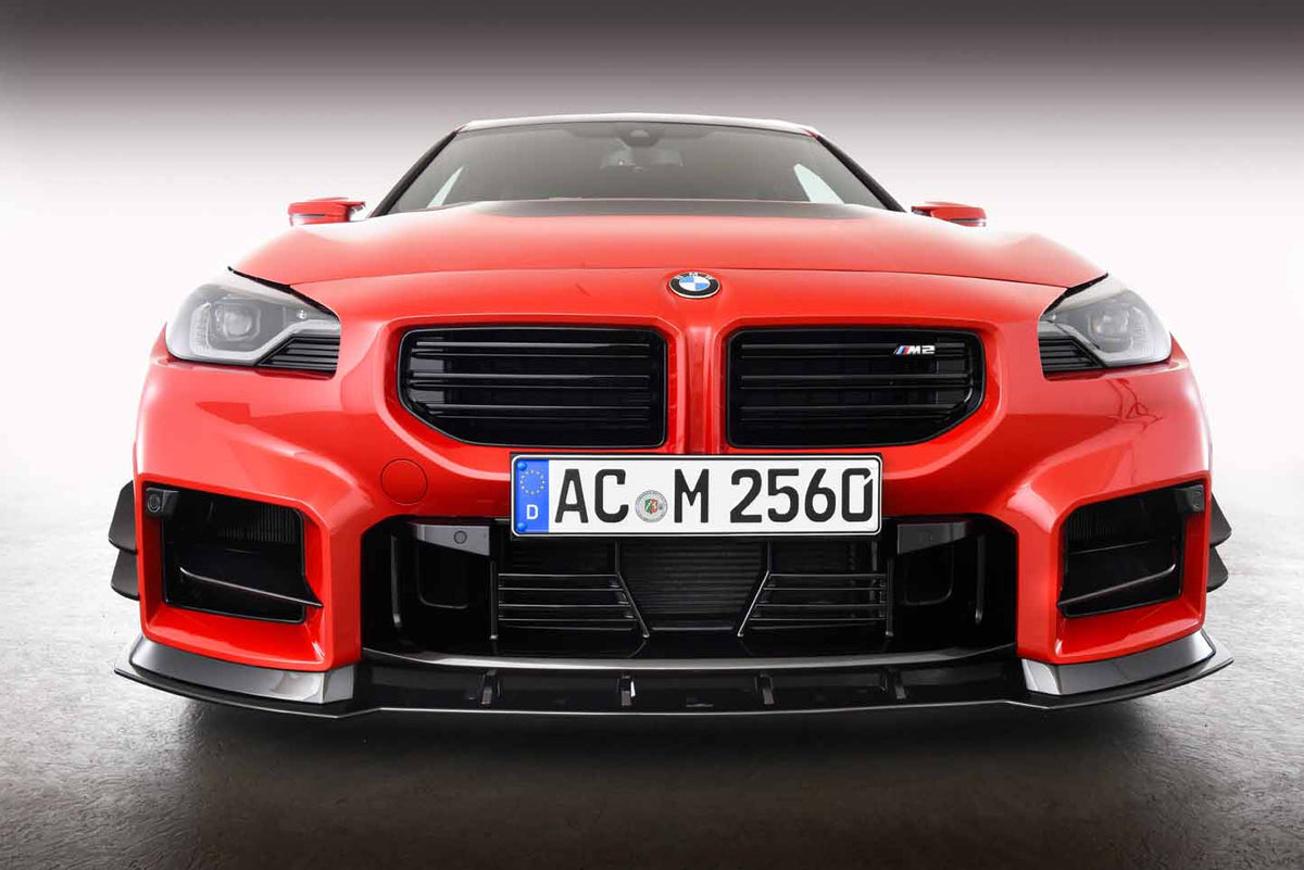 AC Schnitzer BMW M2 G87 front splitter shown in black, designed to enhance aerodynamics and sporty appearance.