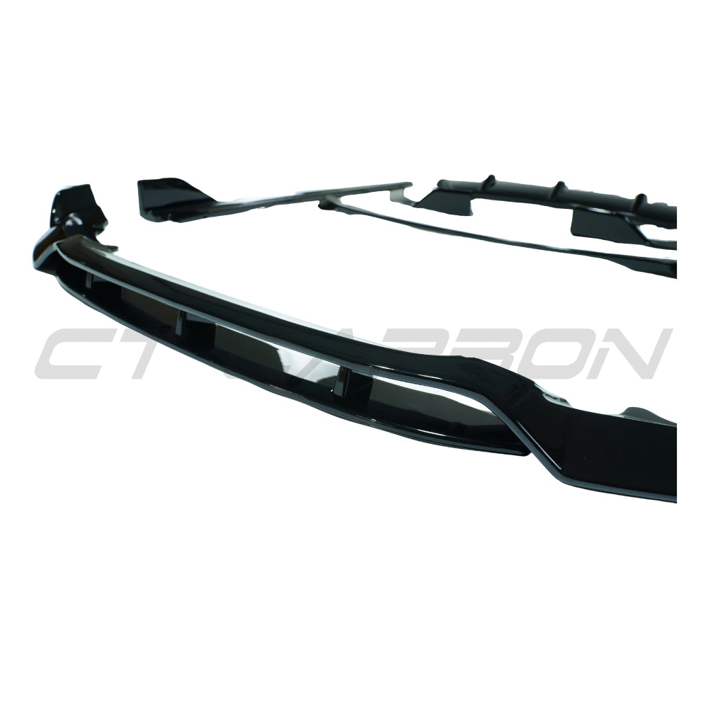 Full gloss black car kit for BMW X6 F16 2014-2018 by CT Carbon, featuring detailed exterior parts and sleek finish.