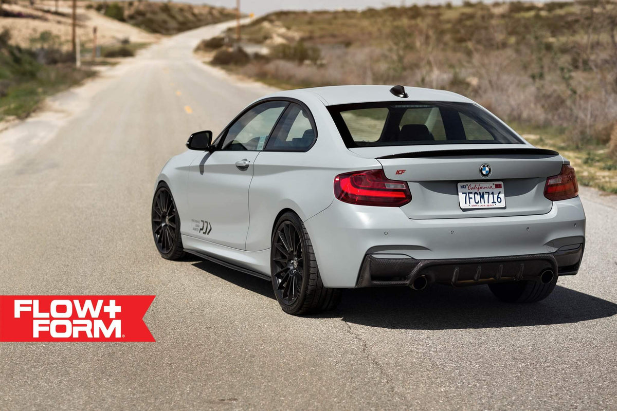 HRE PERFORMANCE WHEELS FF15 alloy wheel with a sleek multi-spoke design and matte finish, shown on a vehicle.