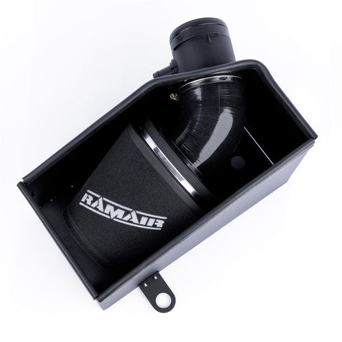 Ramair cone air filter induction kit installed in Audi RS3 8V TTRS 2.5 TFSI engine for enhanced airflow and performance.