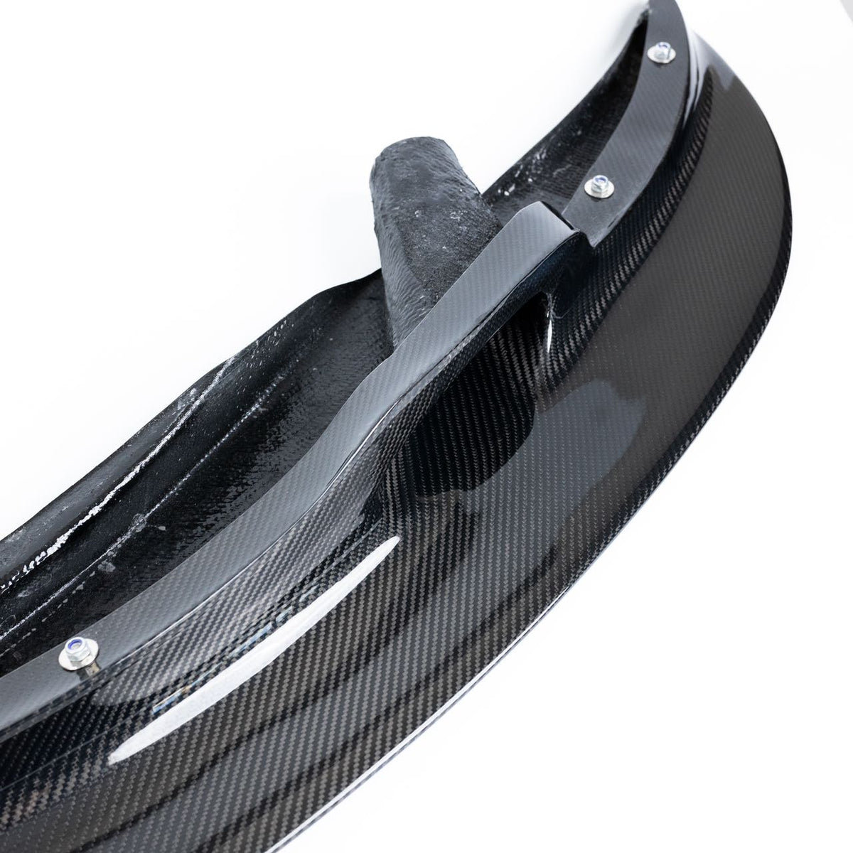 Ridgeline Motorsport E9X M3 GT4 V1 front splitter spoiler for enhanced aerodynamics on a sports car.