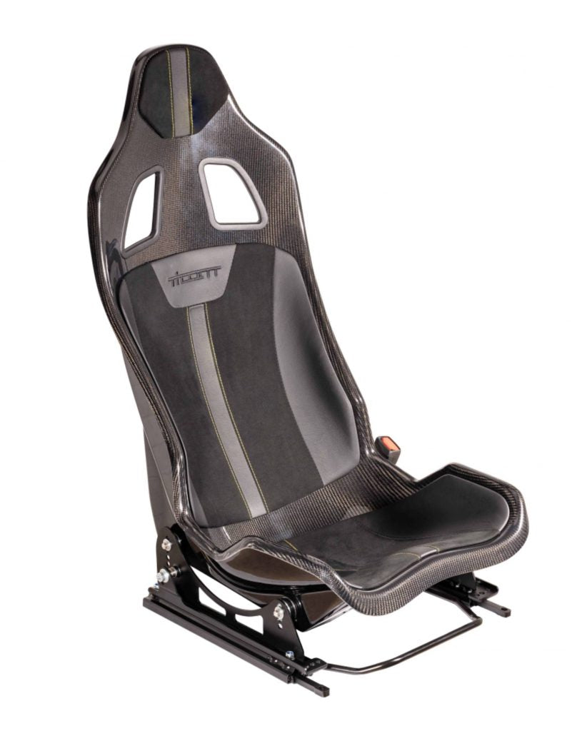 TILLETT B10 Lotus Emira racing seat with padded surface, black upholstery, and ergonomic design for high-performance driving.