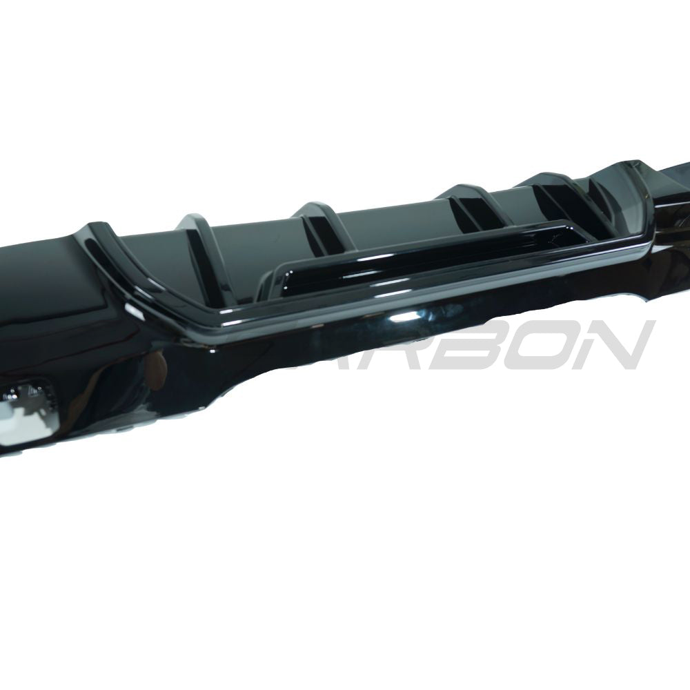 BMW F40 1 Series 2019-2024 CT Carbon gloss black diffuser with single exit, showcasing sleek automotive styling.