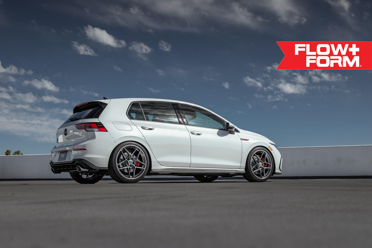 HRE PERFORMANCE WHEELS FF11 alloy wheels with a sleek multi-spoke design and polished finish, displayed on a vehicle.