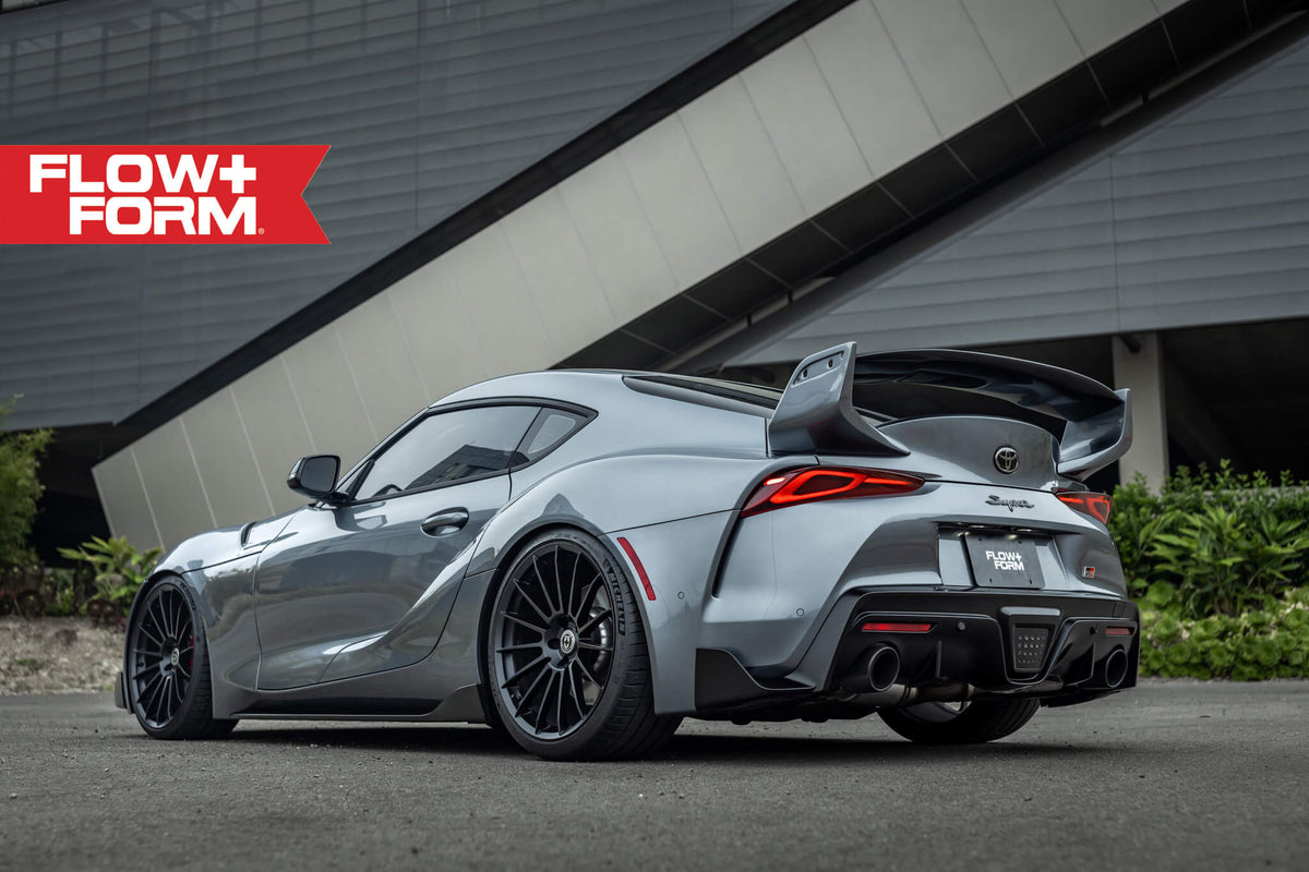HRE PERFORMANCE WHEELS FF15 alloy wheels with multi-spoke design and polished finish, displayed on a vehicle.