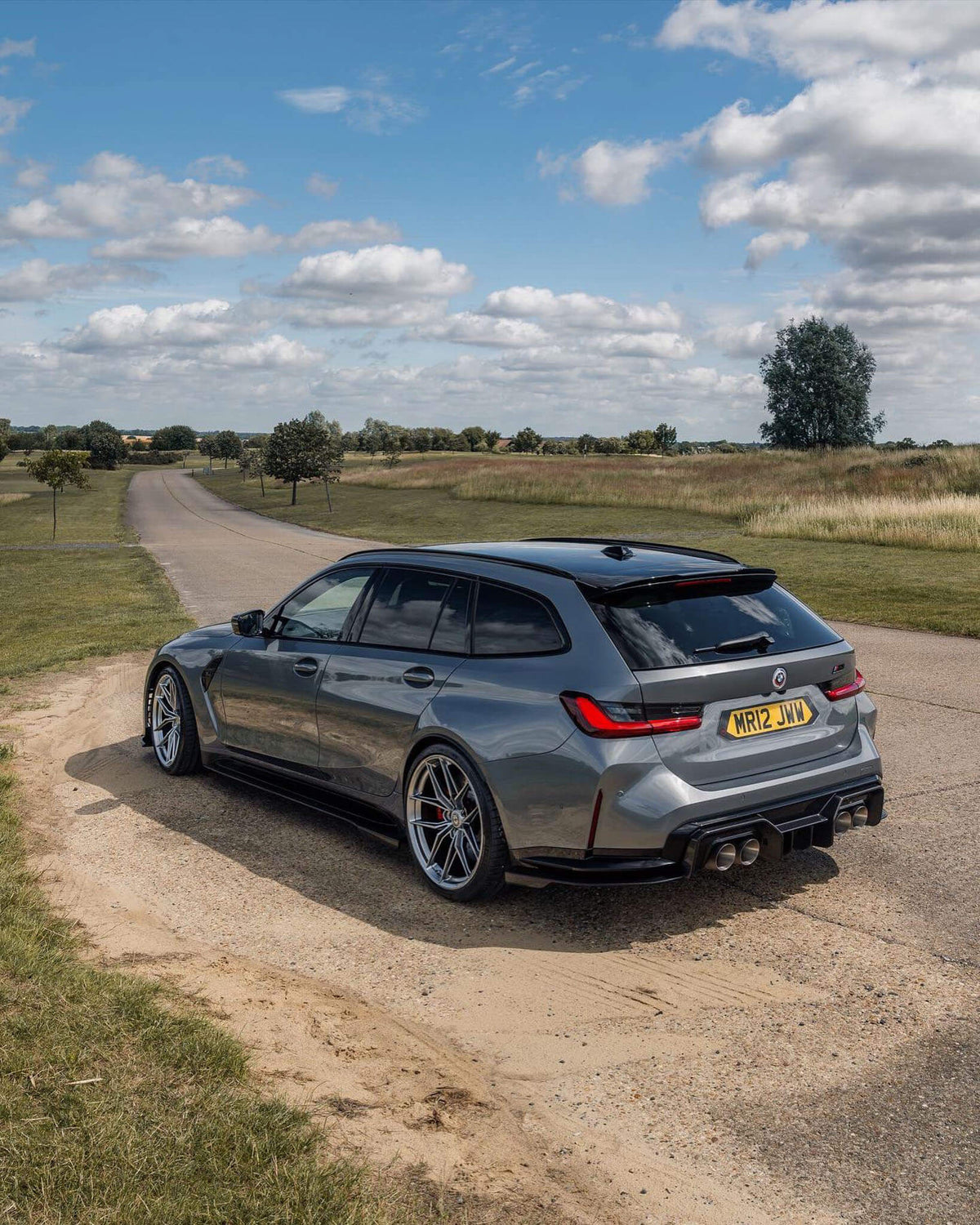 HRE PERFORMANCE WHEELS FF21 alloy wheels with a sleek multi-spoke design, shown on a vehicle, highlighting premium automotive style.