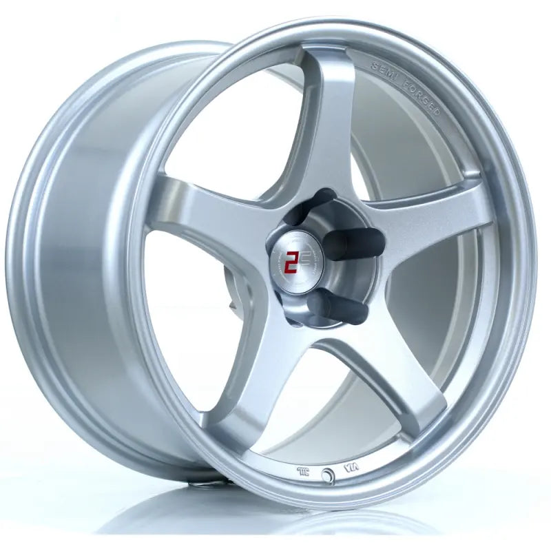 2Forge ZF7 semi-forged wheels, silver finish, featuring multi-spoke design, shown on a vehicle with close-up detail of rim and spokes.