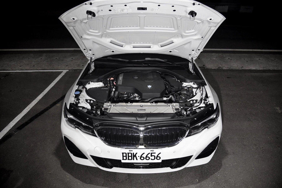 MST Performance induction kit for BMW 3 and 4 Series 2.0T B48 engine, showing the air intake component and hoses.