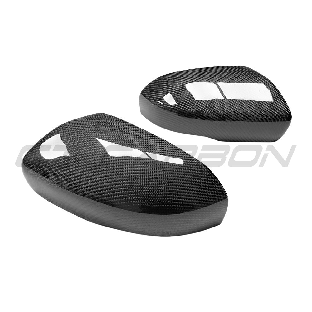 Carbon fibre mirror covers for Land Rover Evoque L538 2012-2013 by CT Carbon, showing sleek, textured mirror accessories.