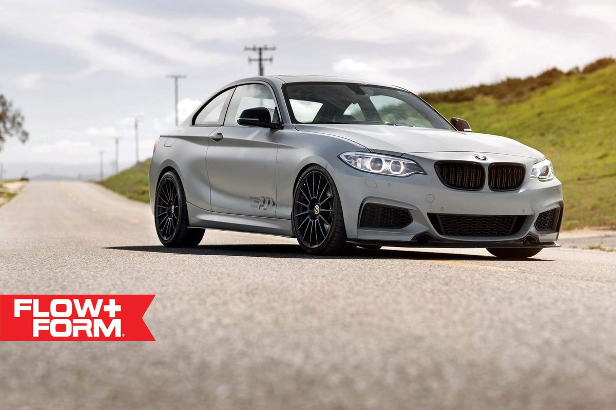 HRE PERFORMANCE WHEELS FF15 alloy wheel with a sleek multi-spoke design, showcasing a polished finish and high-performance style