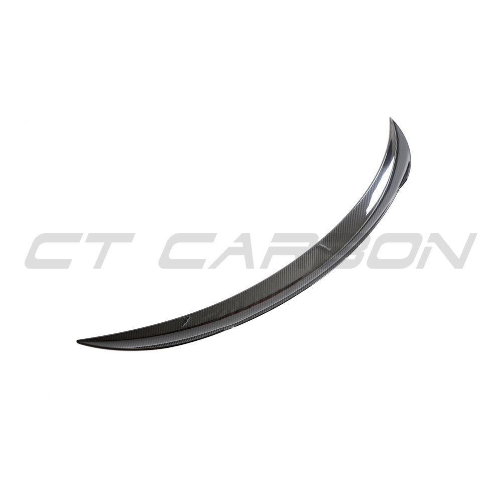 Tesla Model 3 Facelift 2023+ carbon fiber spoiler by CT Carbon, V2, showing sleek black aerodynamic design on the car's rear.