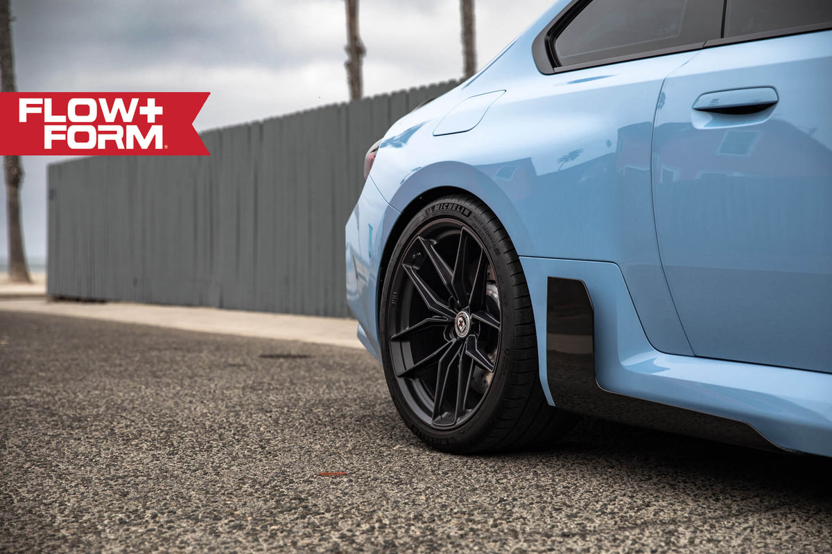 HRE PERFORMANCE WHEELS FF21 alloy wheels with a multi-spoke design and metallic finish, displayed on a vehicle.