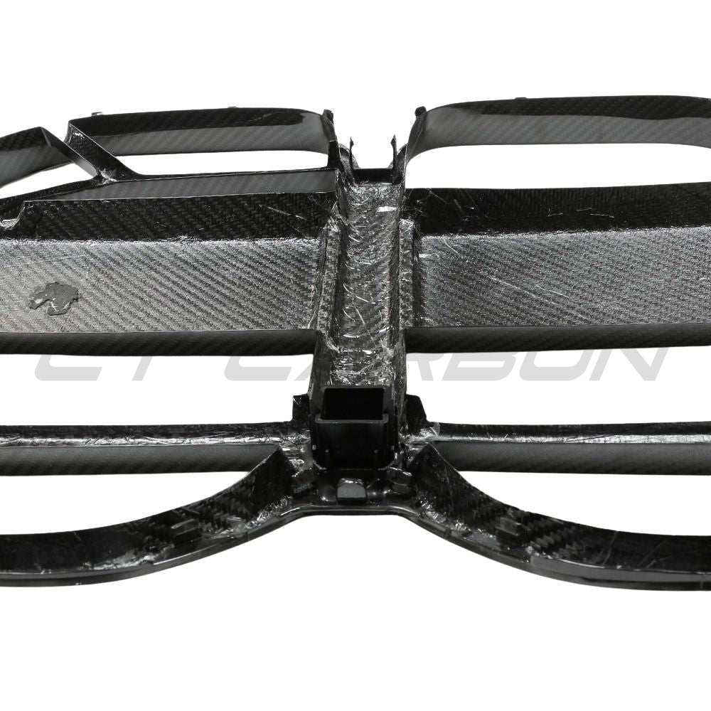 BMW 4 Series G22 G23 carbon fiber CSL grille with ACC from CT Carbon, showcasing sleek, textured automotive grille design.