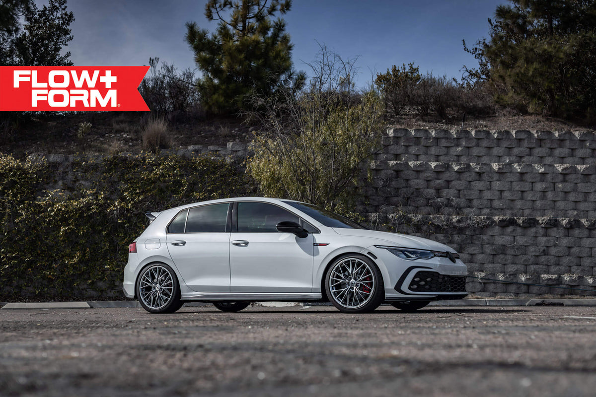 HRE PERFORMANCE WHEELS FF28 alloy wheels with multi-spoke design and polished finish, shown on a car.