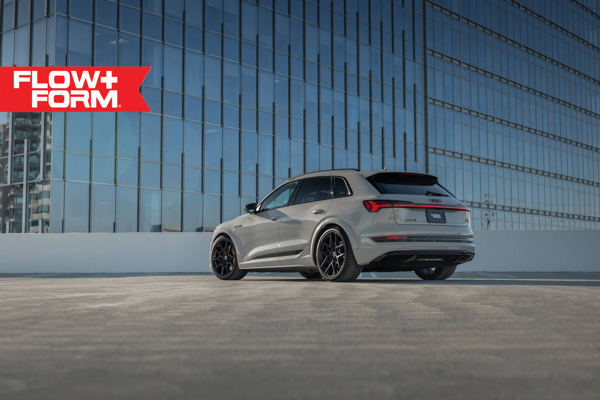 HRE PERFORMANCE WHEELS FF10 alloy wheels with multi-spoke design and polished finish, shown on a vehicle.