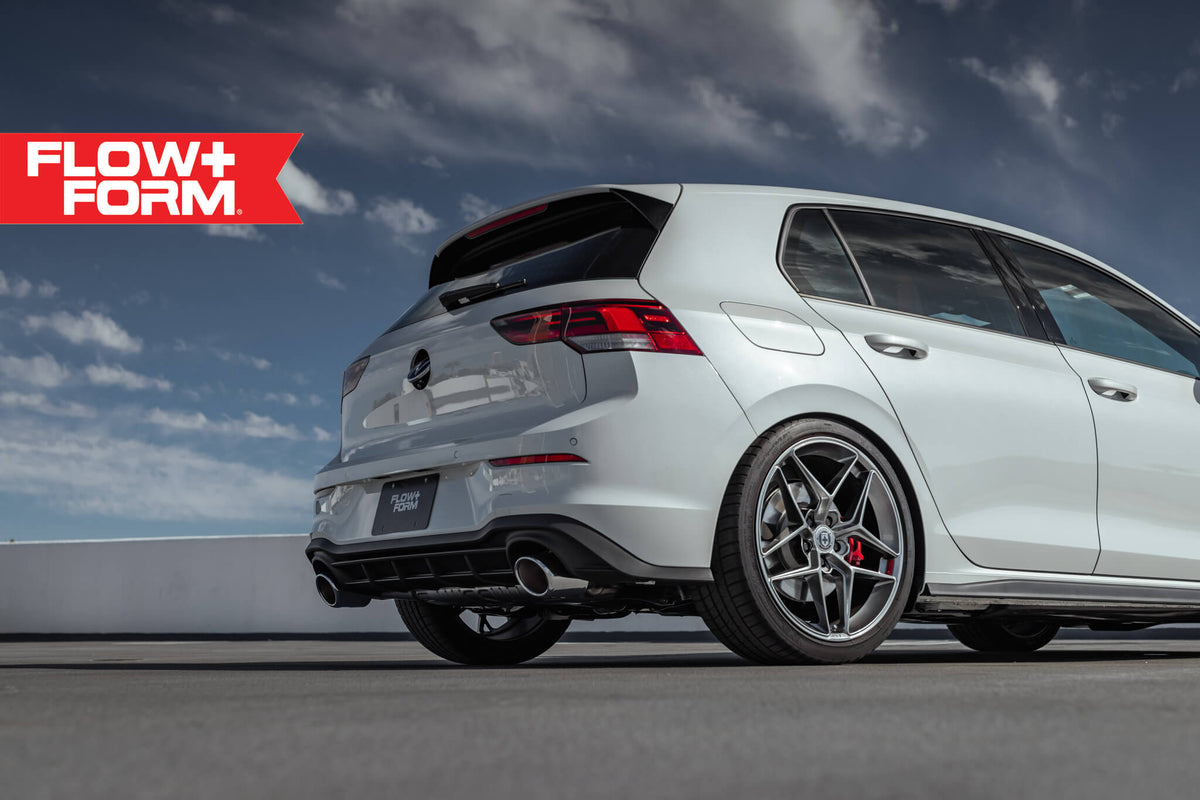 HRE PERFORMANCE WHEELS FF11 alloy wheels with multi-spoke design and polished finish, shown on a vehicle.