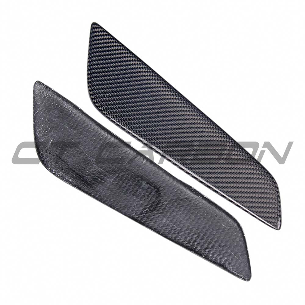 BMW G30 5 Series 2016-2023 dry carbon fiber side fender trims by CT Carbon, showing sleek, textured carbon fiber surface design.