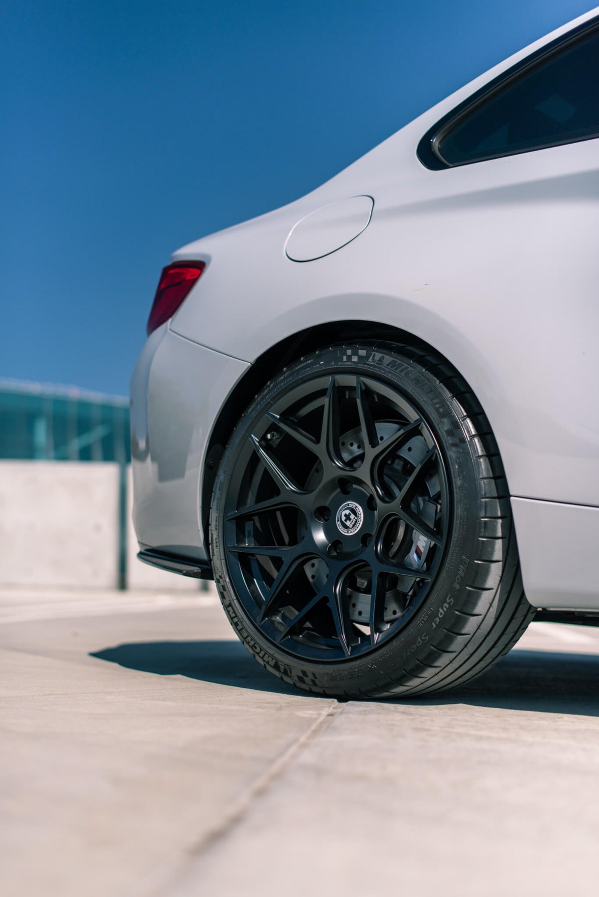 HRE PERFORMANCE WHEELS FF01 alloy wheels with a sleek multi-spoke design, shown on a vehicle.