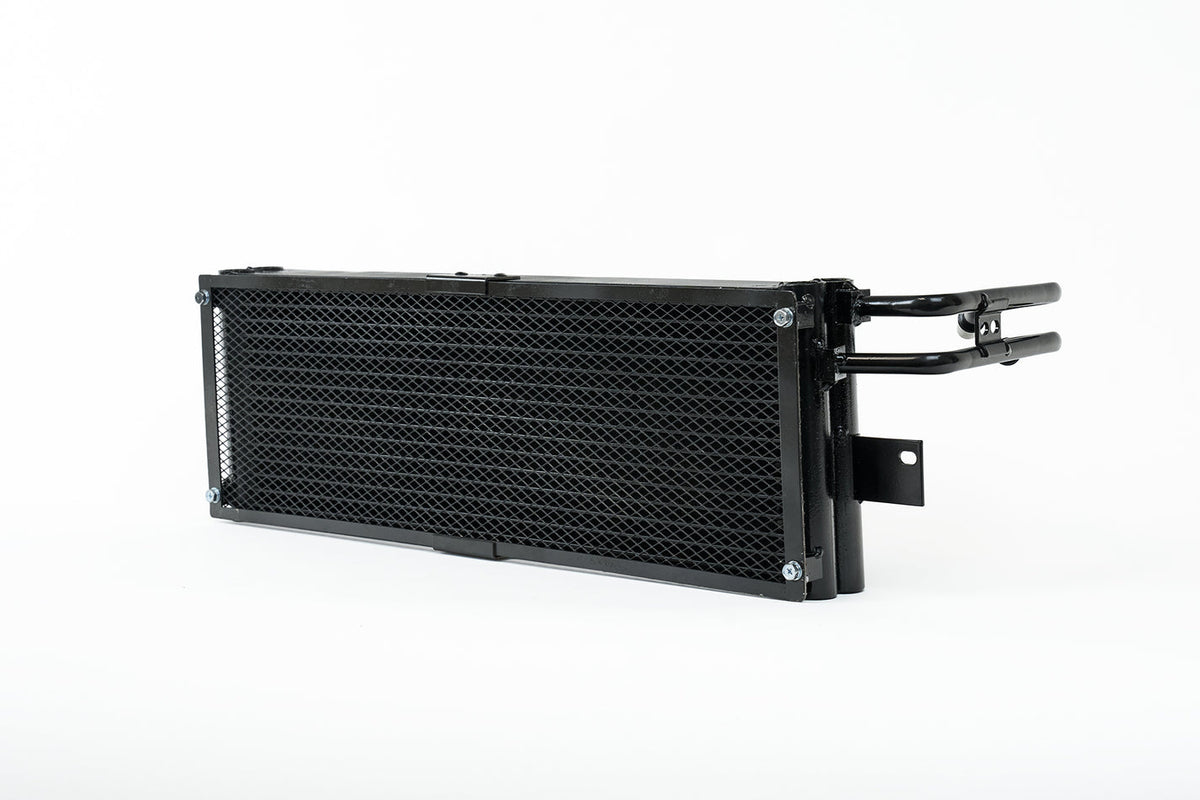 CSF BMW G8X M3/M4 ZF8 transmission oil cooler with rock guard, showcasing the durable cooling component and protective guard.