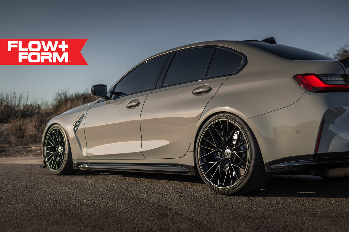 HRE PERFORMANCE WHEELS FF28 alloy wheel with a multi-spoke design in a polished finish, mounted on a vehicle.