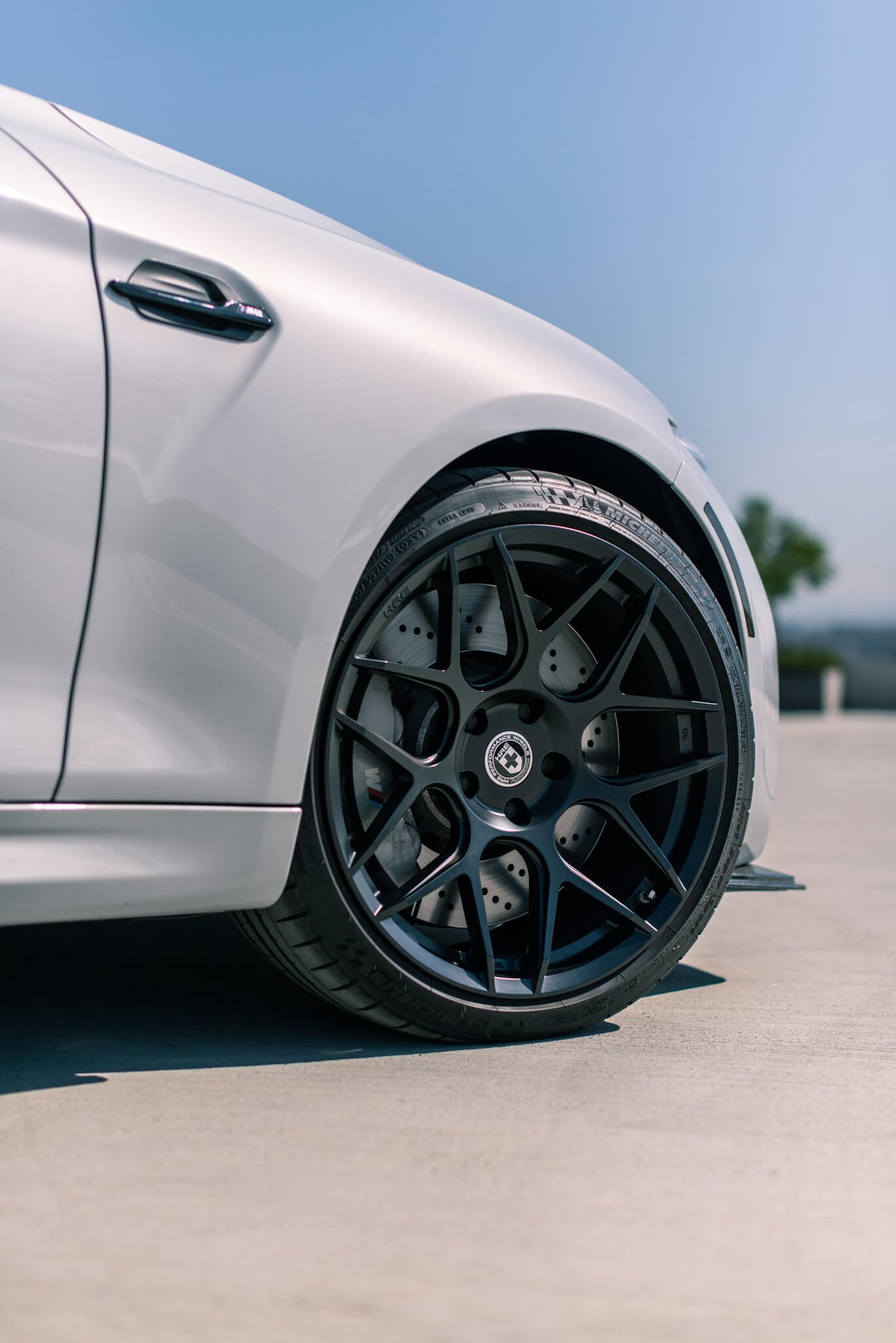 HRE Performance Wheels FF01 set of sleek, multi-spoke alloy wheels with a polished finish for high-performance vehicles.