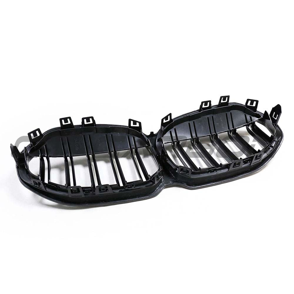 BMW F40 1 Series carbon fiber front grille by CT Carbon, showcasing sleek, textured black grille design for 2019-2024 models.