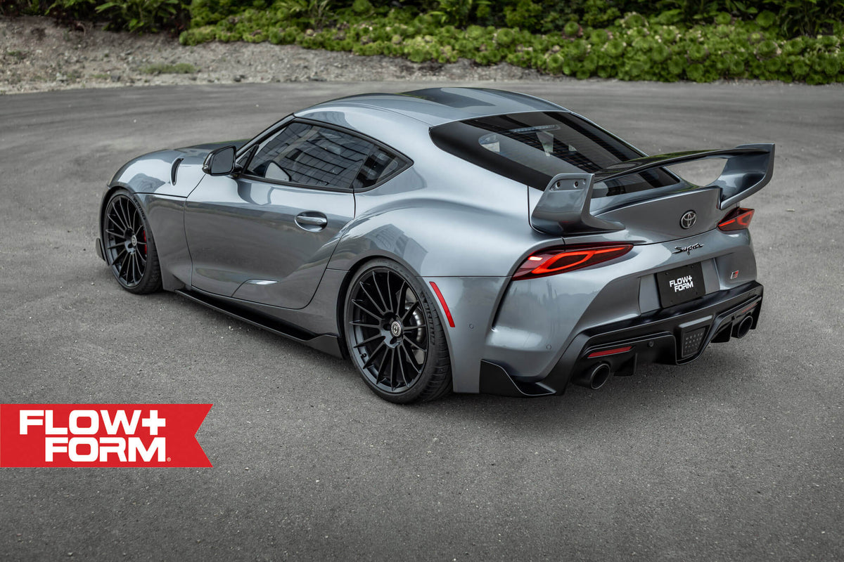 HRE PERFORMANCE WHEELS FF15 alloy wheels with a sleek multi-spoke design, shown on a vehicle.