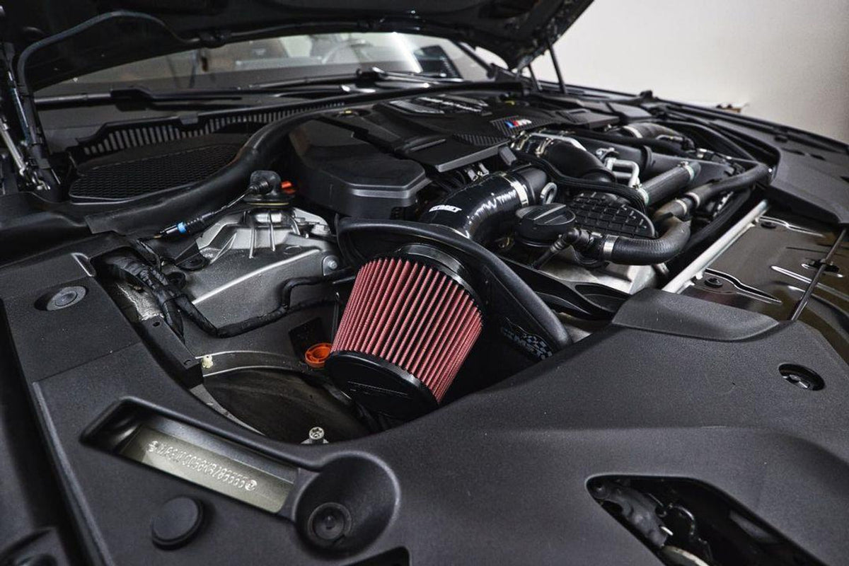 MST Performance induction kit for BMW M5 and M8 including Competition models, featuring air filters and intake tubing.