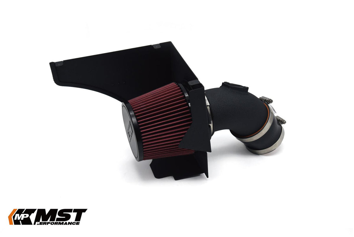 MST Performance induction kit for BMW B58 540i, showing air intake pipes and filter components in a close-up view.