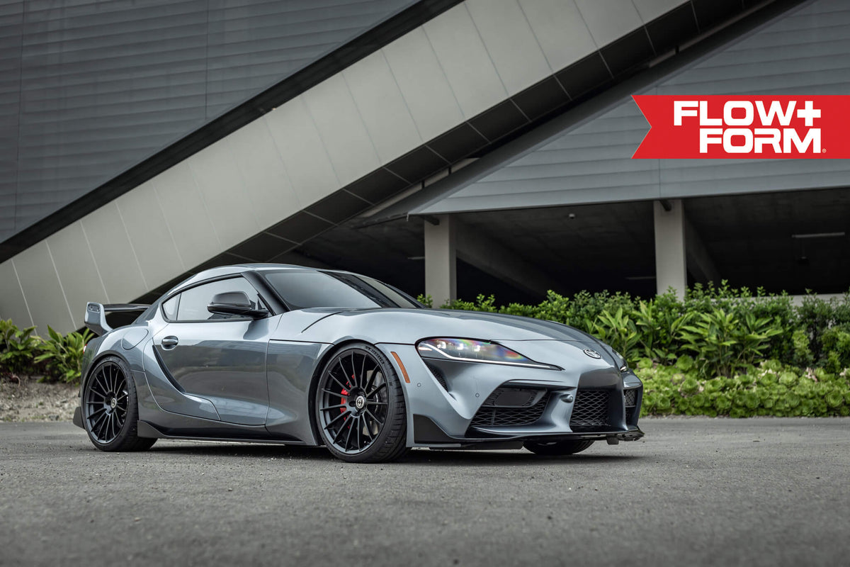 HRE PERFORMANCE WHEELS FF15 alloy wheels with a sleek multi-spoke design, shown on a vehicle.