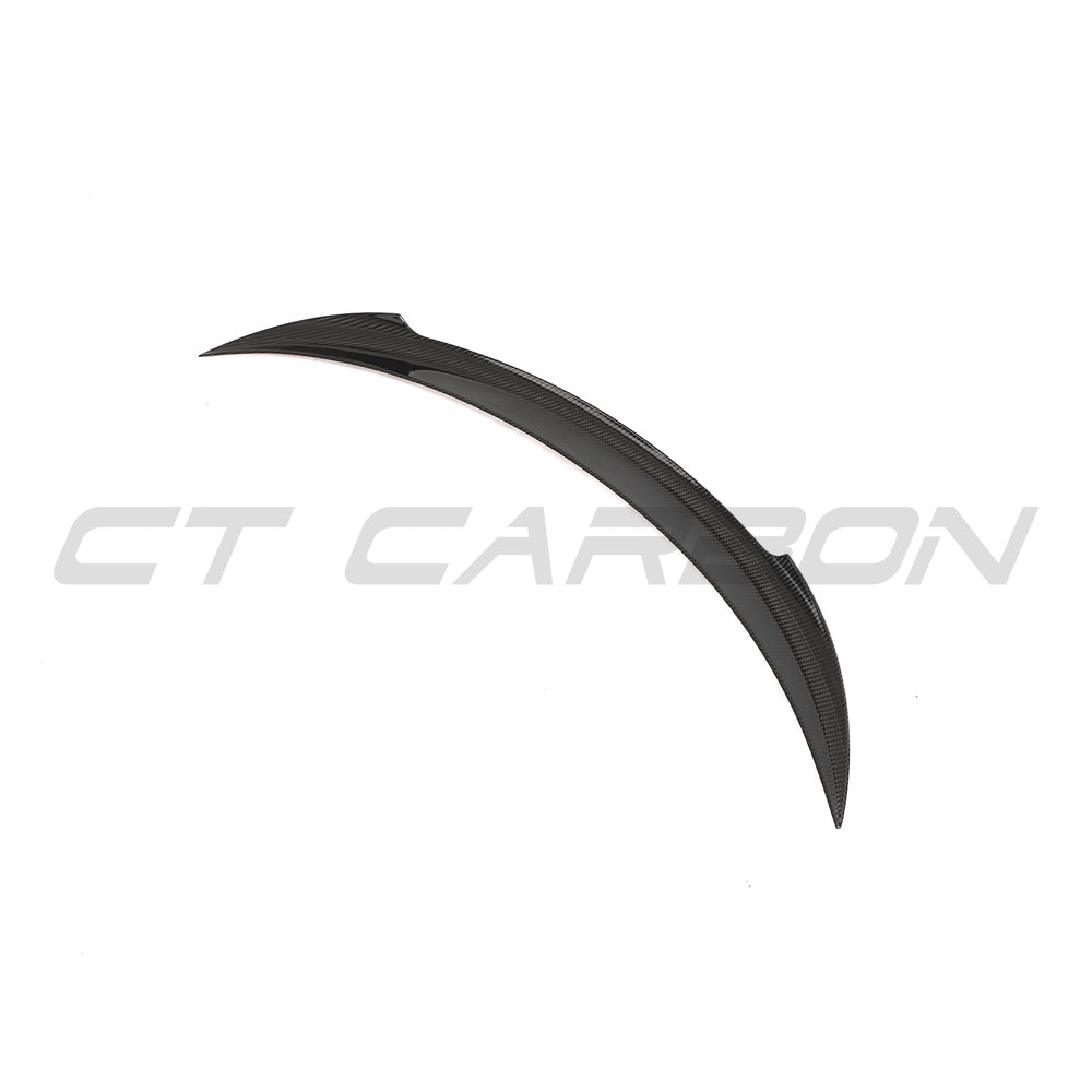 CT Carbon spoiler for Tesla Model 3 Facelift 2023+, carbon fibre V2 rear spoiler on a sleek electric car.