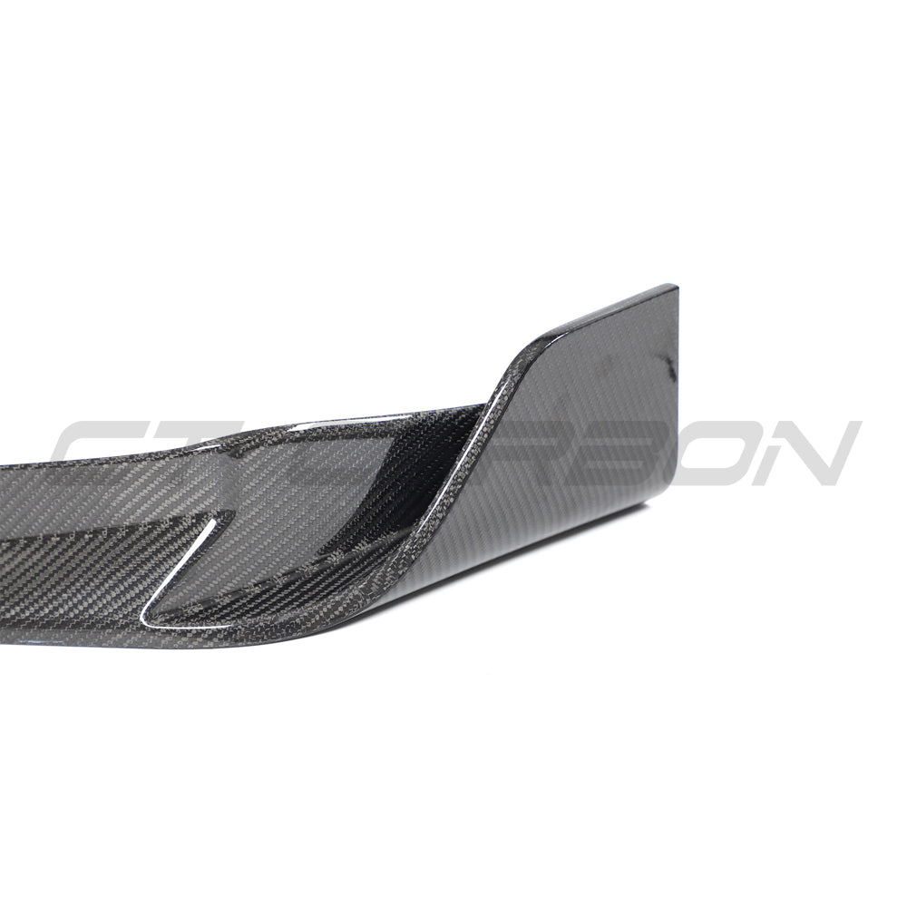 BMW X3/X4 G01/G02 LCI 2022+ CT Carbon carbon fiber splitter installed on front bumper, showcasing sleek, aerodynamic design.