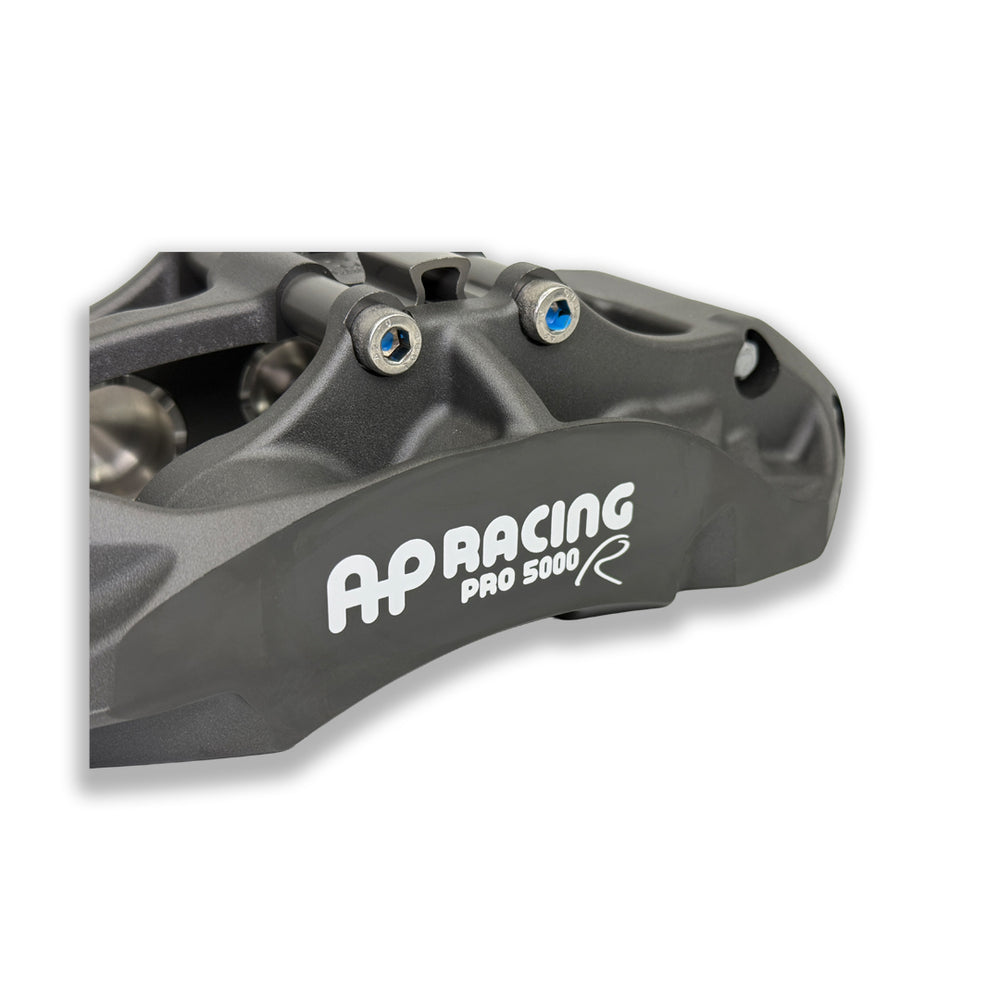 Pair of AP Racing Pro5000R big brake calipers with anodised finish and 6 pistons, designed for high-performance brake kits.