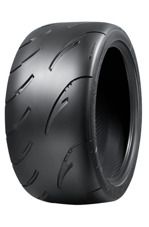 Close-up of Nankang AR-1 tires showing tread pattern and sidewall details for high-performance car use.