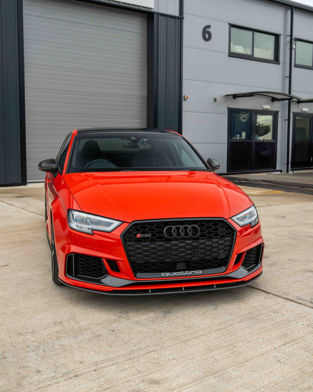 Audi A3 S3 RS3 8V carbon fiber mirror covers with lane assist, featuring sleek pre-preg carbon fiber design and modern safety tech.