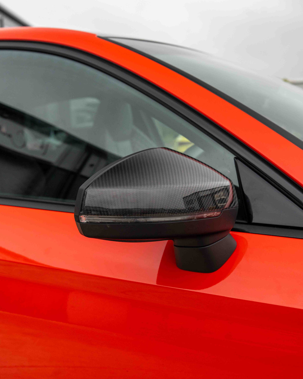 Audi A3, S3, RS3 8V carbon fiber mirror accessories with lane assist from CT Carbon, showing sleek, pre-preg carbon fiber mirrors.