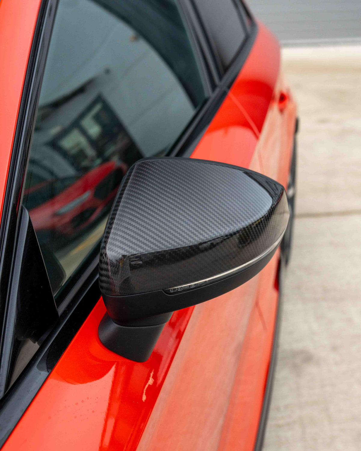 Audi A3 S3 RS3 8V carbon fiber mirror caps with lane assist, featuring sleek pre-preg carbon fiber finish and aerodynamic design.