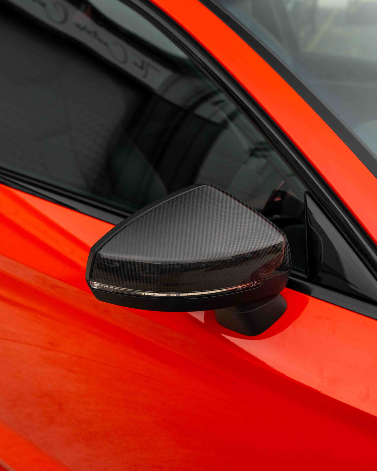Audi A3 S3 RS3 8V carbon fiber side mirrors with lane assist, manufactured by CT Carbon, featuring a sleek pre-preg carbon finish.
