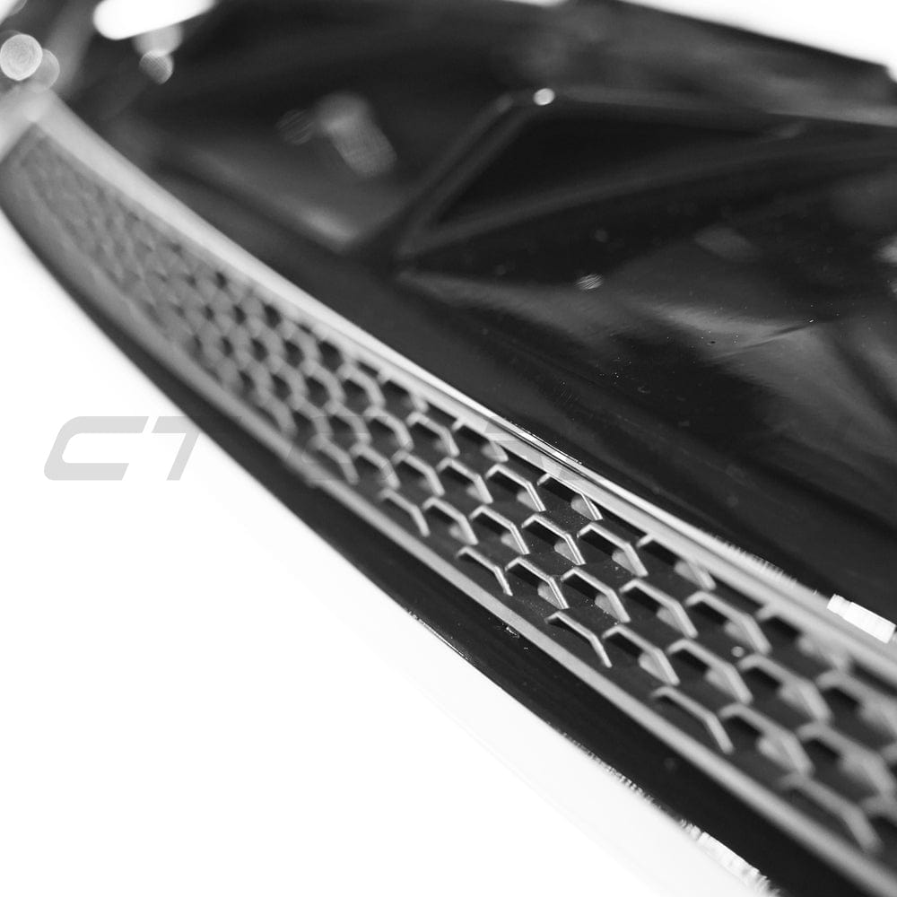 Gloss black diffuser for Audi A4 S-Line and S4 B9 (2016-2019) by CT Carbon, showcasing sleek, aerodynamic design.