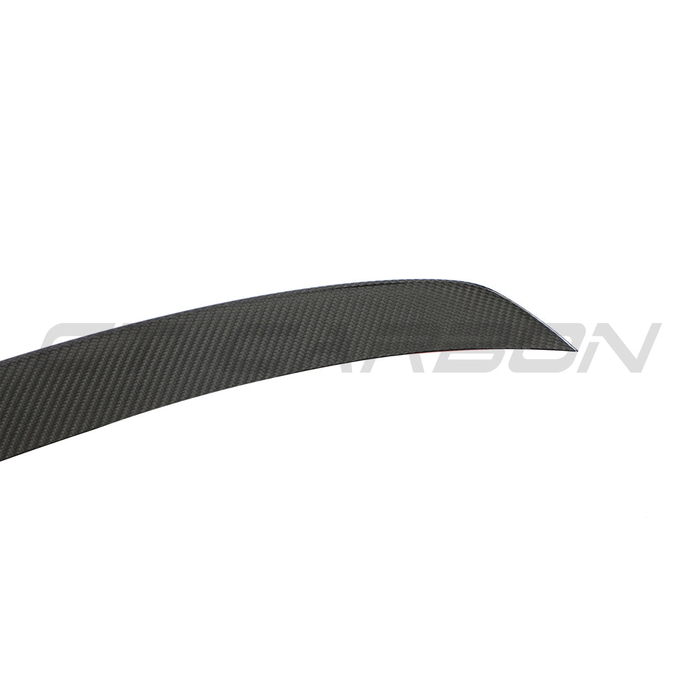Carbon fiber middle spoiler for Audi A4/S4/RS4 B9 and 9.5 by CT Carbon, showcasing sleek, aerodynamic design on vehicle.