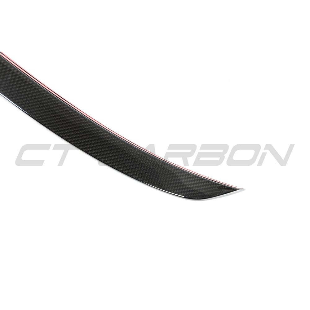Carbon fiber middle spoiler for Audi A4, S4, RS4 B9 & 9.5 by CT Carbon, showcasing sleek aerodynamic design.