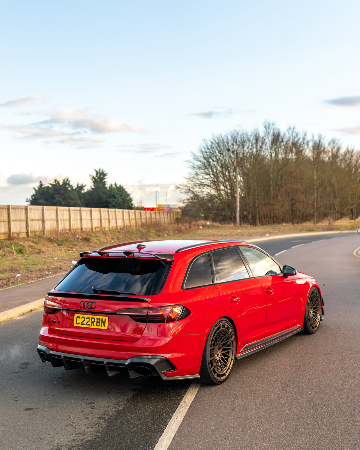 Carbon fibre roof spoiler for Audi RS4 B9 & B9.5 by CT Carbon, shown mounted on the roof of a silver Audi RS4 model.