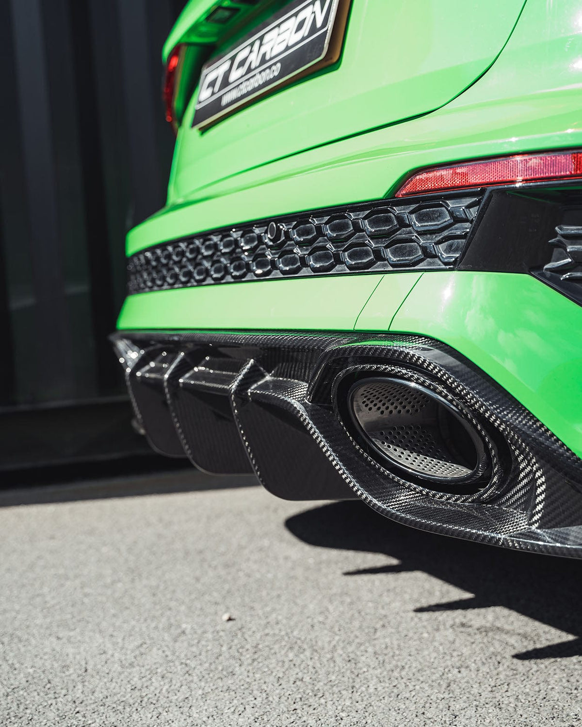 Carbon fibre diffuser for Audi RS3 8Y Sportback 2022-2024 by CT Design, showcasing sleek aerodynamic design.
