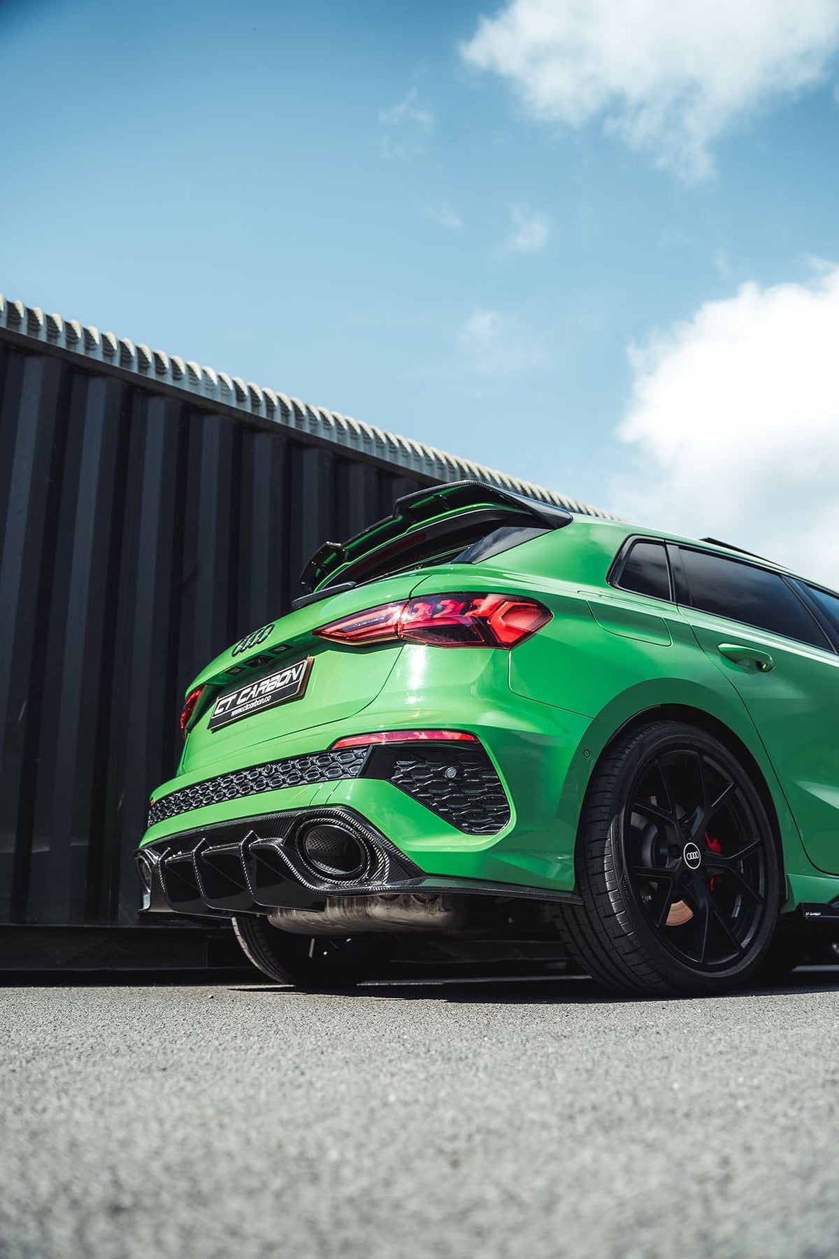 Carbon fibre diffuser for AUDI RS3 8Y Sportback 2022-2024 by CT Design, showing sleek aerodynamic design and textured finish.