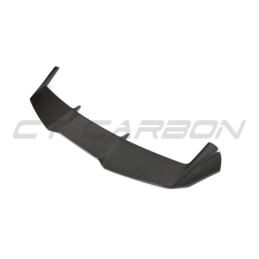 Carbon fiber roof spoiler for Audi RS4 B9/B9.5 2016-2024 by CT Design, shown on car roof with sleek, aerodynamic design.